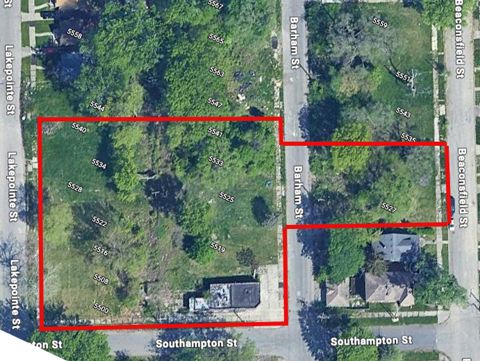 Aerial view of the existing Detroit block with vacant lots and mature trees outlined in red.